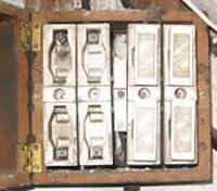 Wooden fusebox with cermic fuses