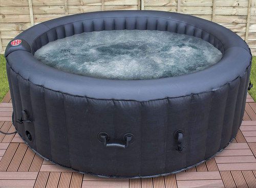 Inflatable spa in use outside