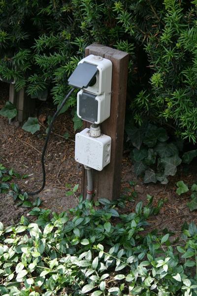 Outdoor socket on a post